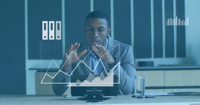 Businessman gesturing on tablet, initiating data overlays showing trends with charts, cloud icons