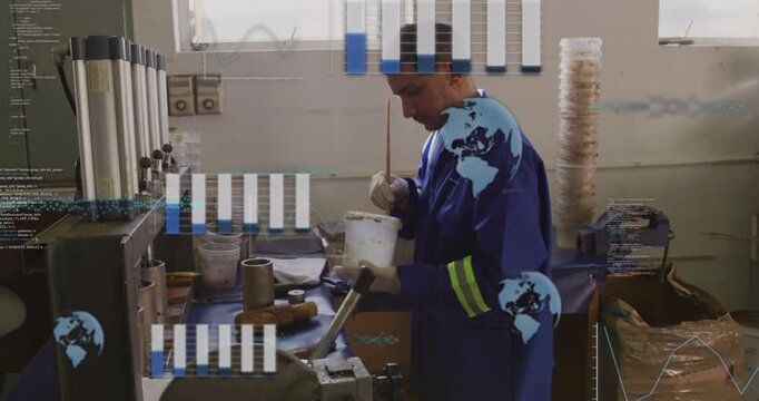 Tech starting stir applying paste onto metal at workshop bar charts and globe icons over worker