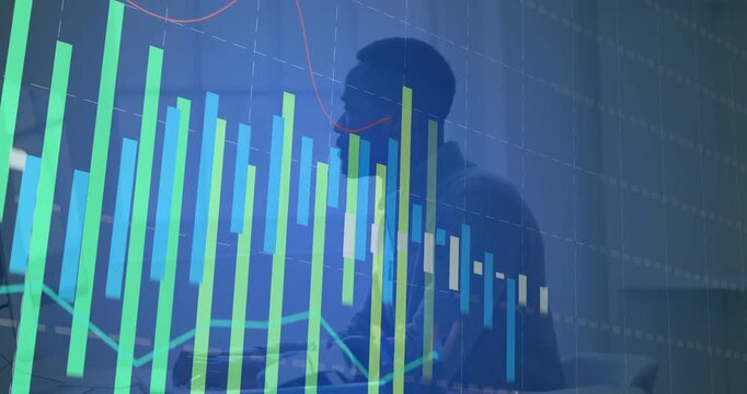 Vertical video: Leaning man in blazer checking laptop at desk as chart overlay appears, copy space