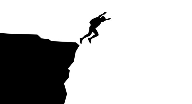 Silhouette of a Person Jumping off a High Cliff