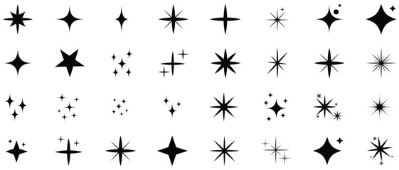 Fototapeta premium Collection of black starburst shapes and sparkles
