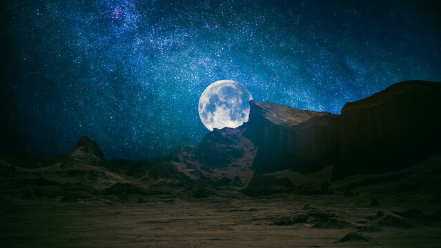 Surreal Full Moon Rising Over Dark Mountain Range Milky Way Galaxy with Copy Space