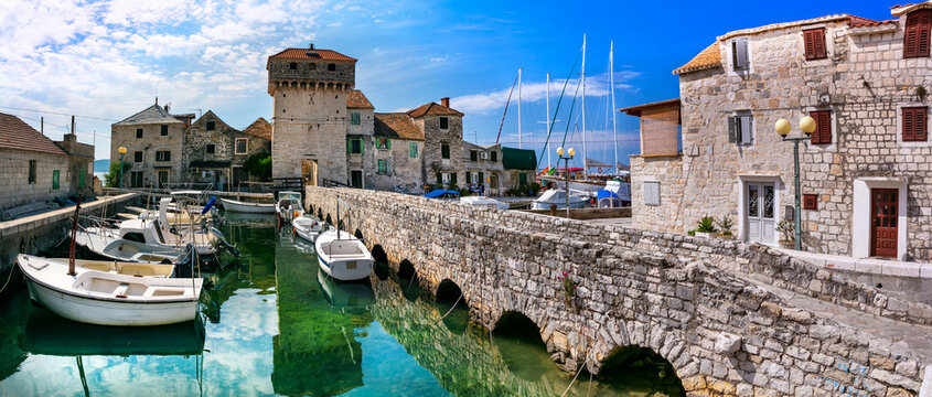 Croatia Kastel Gomilica Aerial View of Authentic Medieval Village and Ancient Stone Bridge with Fishing Boats No People Game of Thrones Filming Location Braavos Scenic Mediterranean Architecture