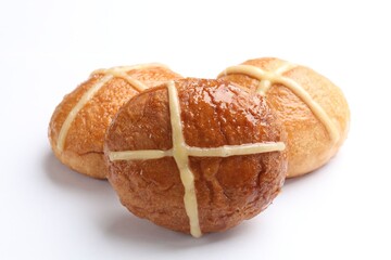 Tasty hot cross buns isolated on white