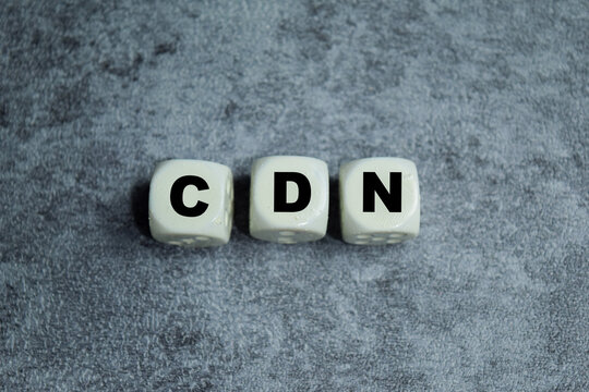 Concept of text CDN - Content Delivery Network on wooden blocks.
