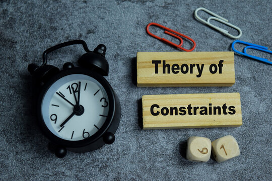 Concept of text theory of constraints on wooden blocks.