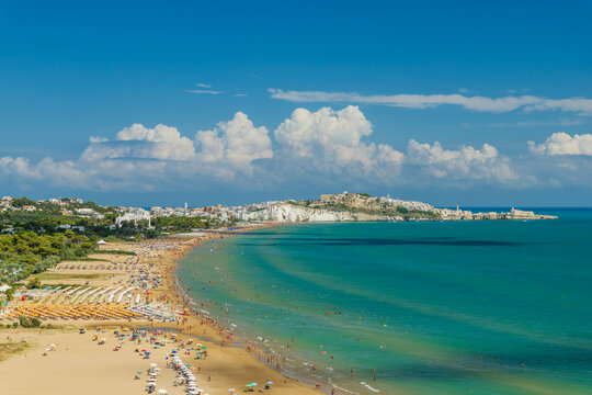 Crowded Vieste beach on Adriatic Sea during summer, Apulia