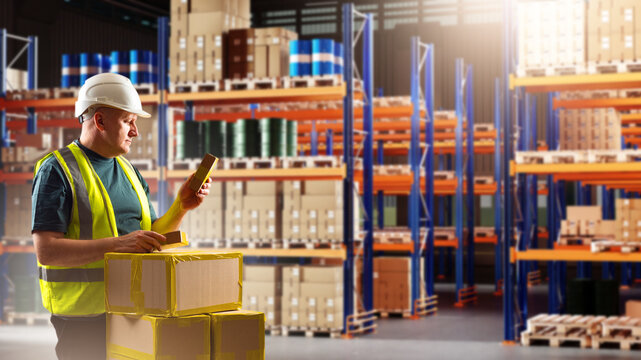 Warehouse logistics, inventory control and packaging. Male worker in safety helmet scans parcel and checks boxes on storage racks, order processing, distribution operations and stock management.