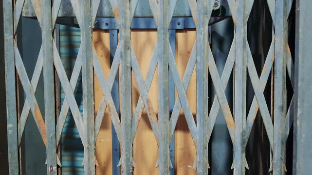 Abstract metal folding gate pattern urban security grill texture