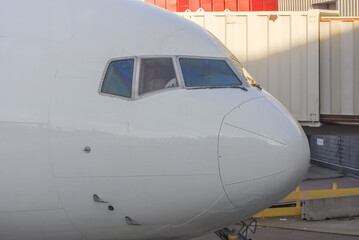 close up on airplane nose in the airport
