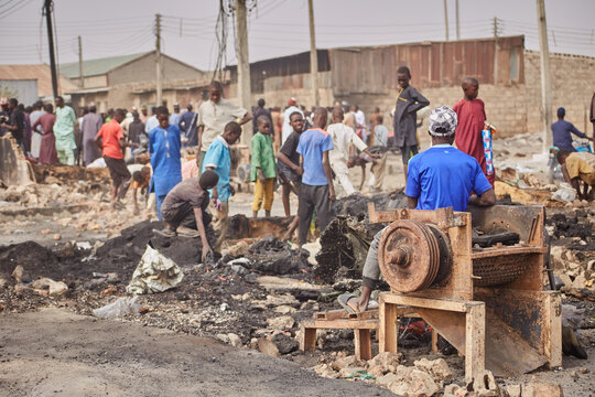 Kano, Nigeria - 27 January 2024: View of a bustling scene near Fatima Market in Dakata, where people gather amidst the aftermath of a fire.
