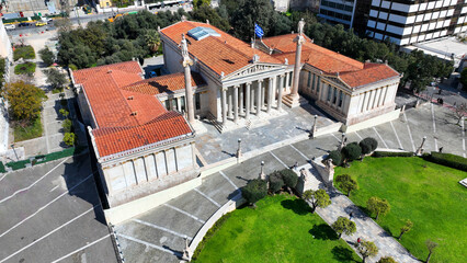 Naklejka premium Aerial drone photo of historic Neoclassic building of Academy of Athens featuring statue of goddess Athena in Acadimias street, Attica, Greece