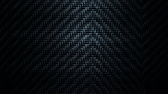 Dark carbon fiber texture background with a subtle woven pattern and central light reflection, ideal for modern design, automotive, and technology concepts.
