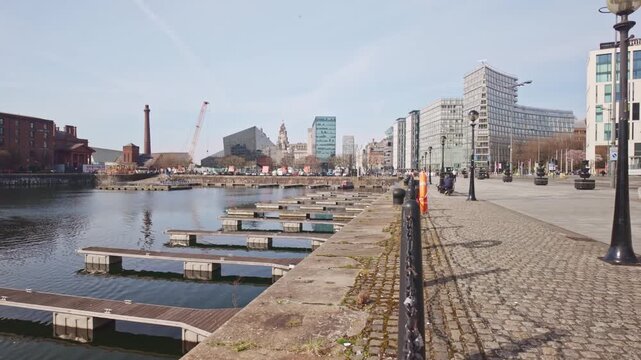 Modern Mann Island Apartments Reflected in the Historic Port of Liverpool Building