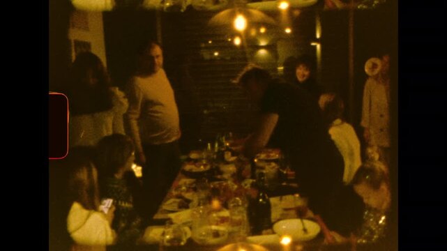 Detailed view of roast meat being carved with a large knife on analog super 8mm film