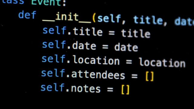 Developer software programming python code with chat bot AI. HTML code on lcd screen. Developer working on source codes on computer at office. Modern technologies, web design. Python programming