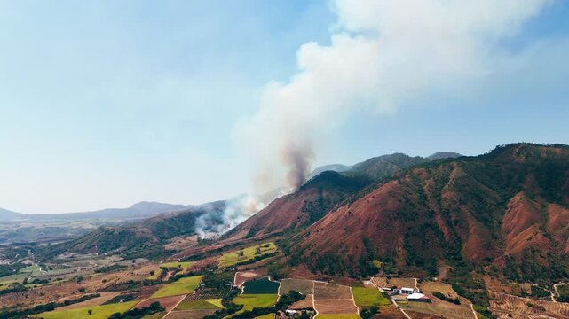 Wildfire smoke polluting the air above mexican landscape near tepic nayarit