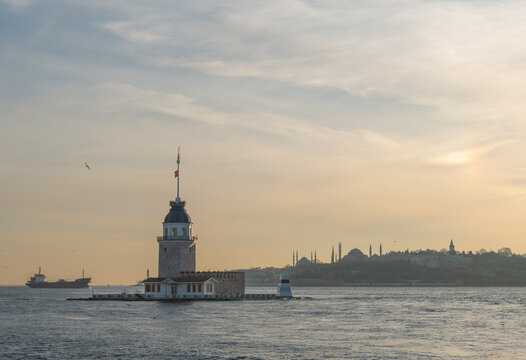 Iconic Maiden's Tower on the Bosphorus at sunset with Istanbul scane