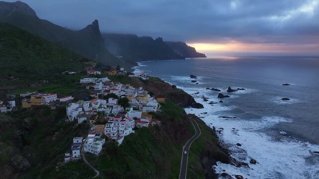The road along the Atlantic Ocean near the village of Almaciga in Anaga Rural Park in Tenerife. Canary Islands. Aerial video.