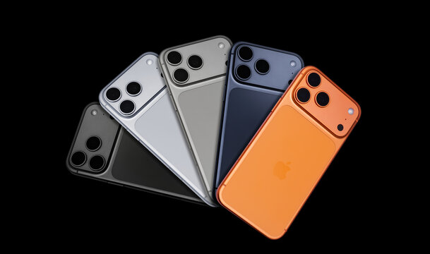 Conceptual fan arrangement of the unreleased Apple iPhone 17 Pro Max smartphones displaying various back colors - Sonora, Mexico - March 19, 2026