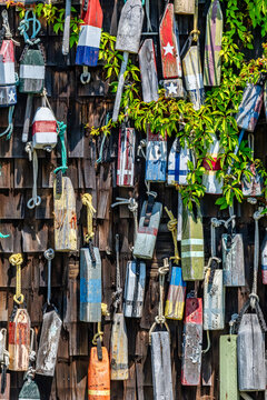 Discover the Charm of a Nautical Fisherman's Shack Decked with Colorful Lobster Buoys, Annisquam, Massachusetts, USA