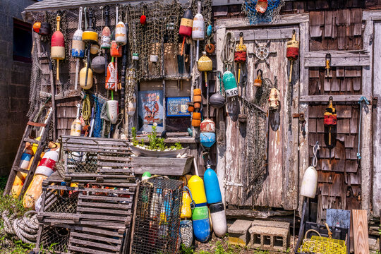 Coastal Fishing Shack Decorated with Colorful Floats and Lobster Traps &ndash; A Charming New England Nautical Scene, Massachusetts, Rockport, USA