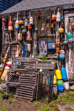 Coastal Fishing Shack Decorated with Colorful Floats and Lobster Traps &ndash; A Charming New England Nautical Scene, Massachusetts, Rockport, USA
