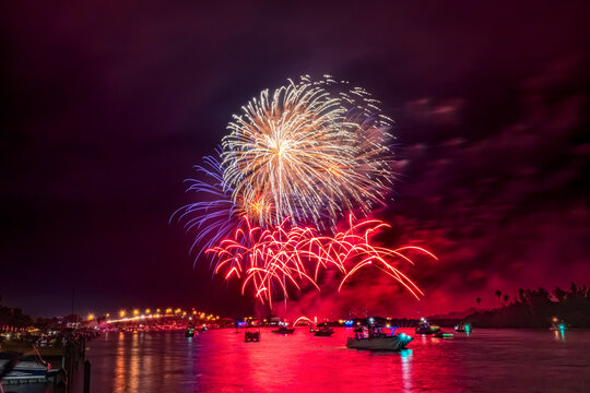 Spectacular Fireworks Display Over a Vibrant Night Sky in Florida, Indian River Lagoon, New Smyrna Beach, USA