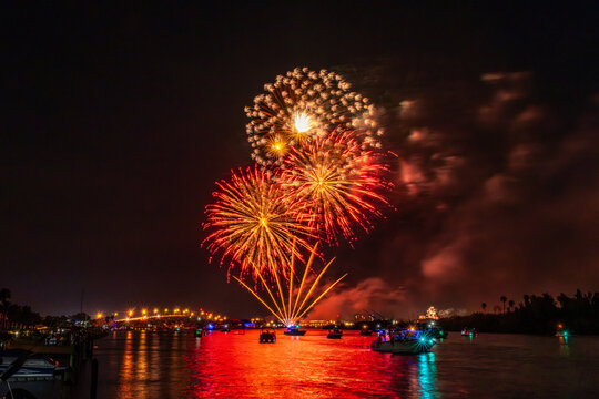 Spectacular Fireworks Display Over a Vibrant Night Sky in Florida, Indian River Lagoon, New Smyrna Beach, USA