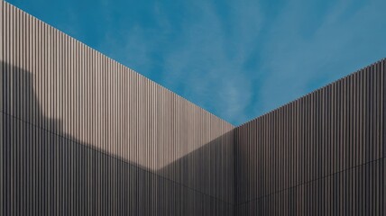 A modern building with a unique design under a blue sky