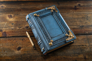 vintage leather book on the wooden table 
