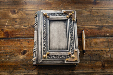 vintage leather book on the wooden table 