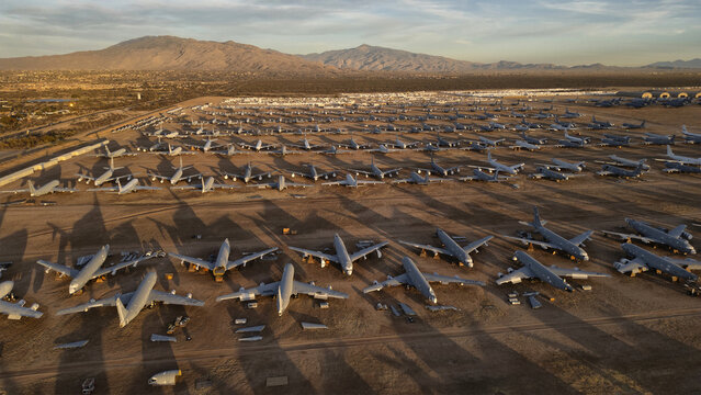 Tucson, United States - 30 January 2025: Aerial view of rows of decommissioned aircraft glinting in the Arizona sun, a silent testament to aviation history.