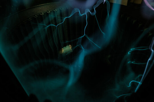 Dark background from the inside lightning generator equipment. Plasma device that generates lightning-like electrical discharges.