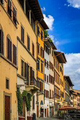 Fototapeta premium Gothic buildings on a narrow street in Centro Storico of Florence, Italy