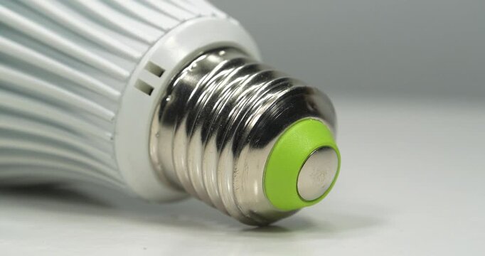 E27 base of large LED lamp, close-up shot video
