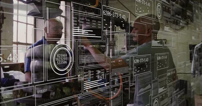 Senior operator rotating controls, guiding trainee in shop while HUD schematics updating gauges