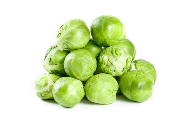 Fototapeta premium Fresh Green Brussels Sprouts Pile Isolated on White Background - Healthy Organic Vegetables