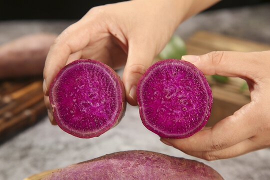 Fresh Purple Vietnamese Sweet Potato Cut in Half Showing Vibrant Interior