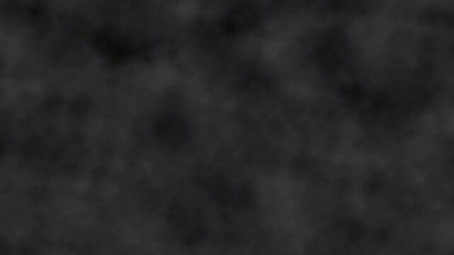A dark, blurry, and textured background with a smoky or cloudy appearance, creating an abstract visual.
