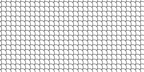 Seamless geometric pattern featuring black and white traditional fish scale or scallop shapes © Sutana