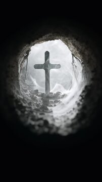 Cave filled with fog swirling around a crucifix in the opening of the empty tomb. Symbolic of the resurrection of Jesus Christ. Good Friday, He is Risen concept. Symbolizing faith or belief. Loop.
