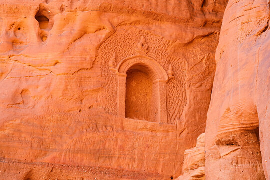Ancient Nabataean votive shrine carved into the cliffs of Jabal Ithlib in Hegra, AlUla, Saudi Arabia