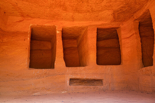 Deep burial niches inside a Nabataean funerary chamber at Jabal AlAhmar in Hegra, AlUla, Saudi Arabia