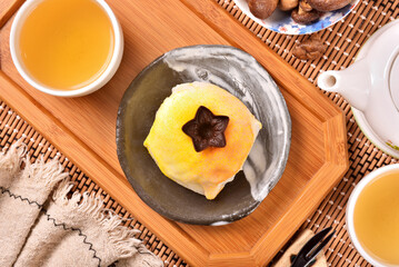 Mango-flavored Japanese mochi on the plate 