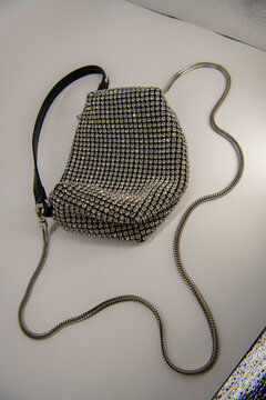 Bag made of duchesse and embellished with luminous crystals, street style details