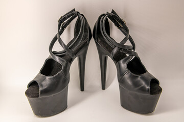 High-heeled strips on a white background. Shoes for strip. Shoes for the pole dance, exotic. © Tatiana Kashko