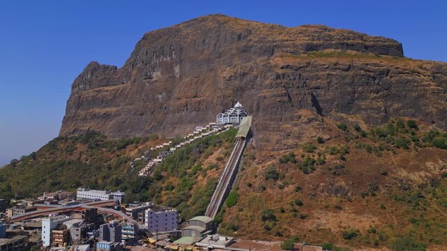 Drone shot of Saptashrungi Devi Temple, Vani Nashik, one of the sacred Sade Teen Shakti Peethas of Maharashtra perched on a scenic hilltop with breathtaking mountain views