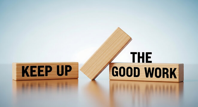 Motivational wooden blocks with 'Keep up the good work' message