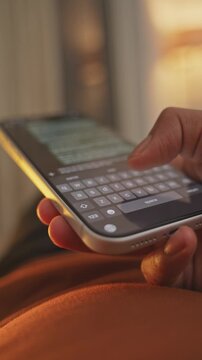 Man hands chatting and typing on smartphone macro closeup. Unrecognizable human typing text message tapping touchscreen keyboard using whatsapp application a social media